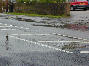 Water springs eternal - Grinstead Lane suffering a couple of leaks. Click for larger picture