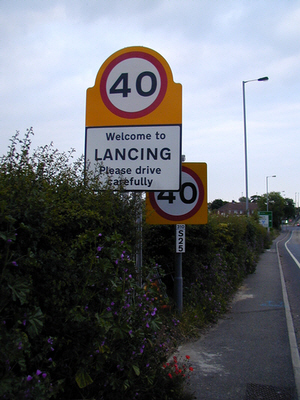 The "Welcome to Lancing" sign in the middle of Sompting!